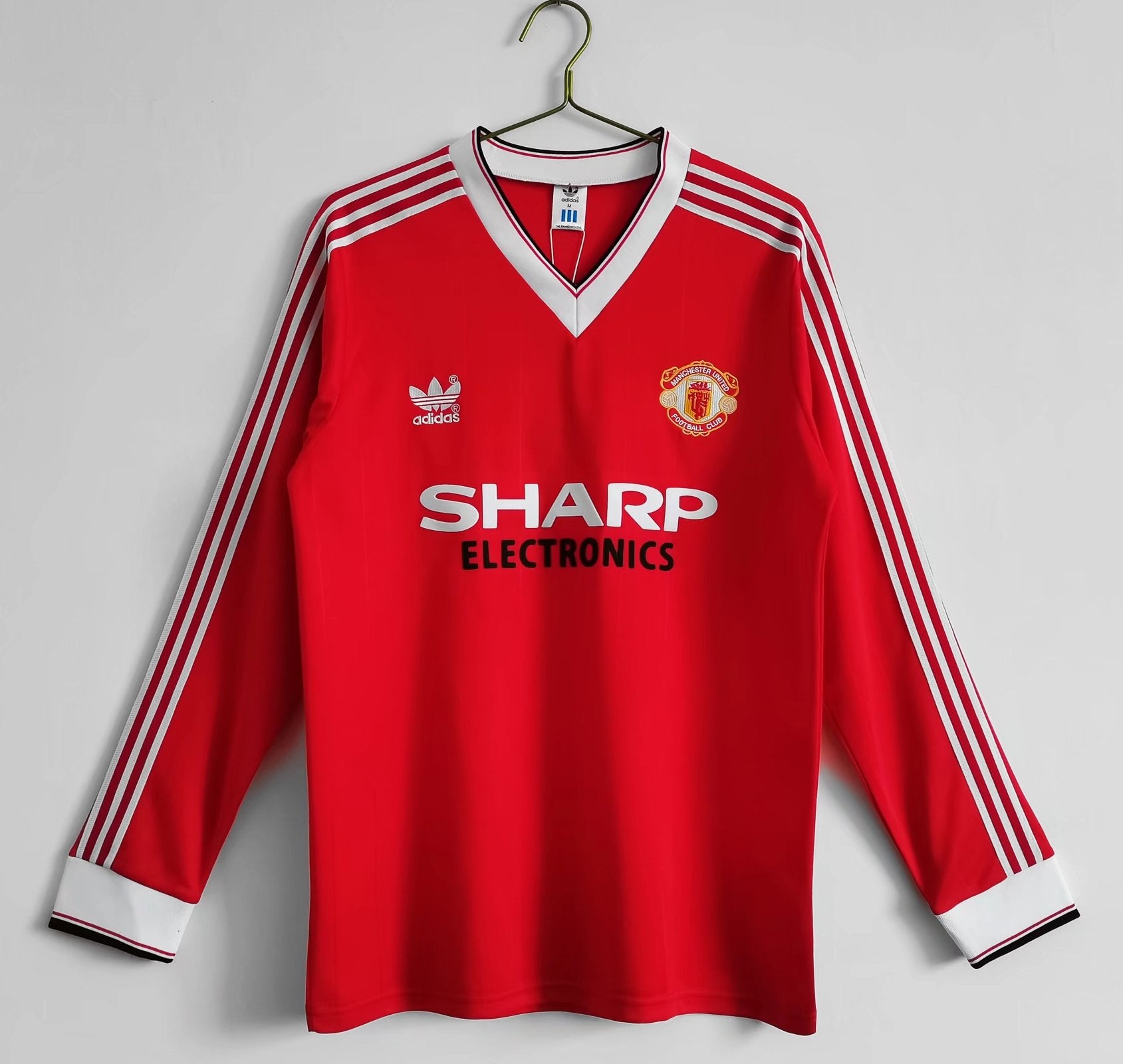 MAILLOT MANCHESTER UNITED DOMICILE 1982/1983 VERSION MANCHES LONGUES